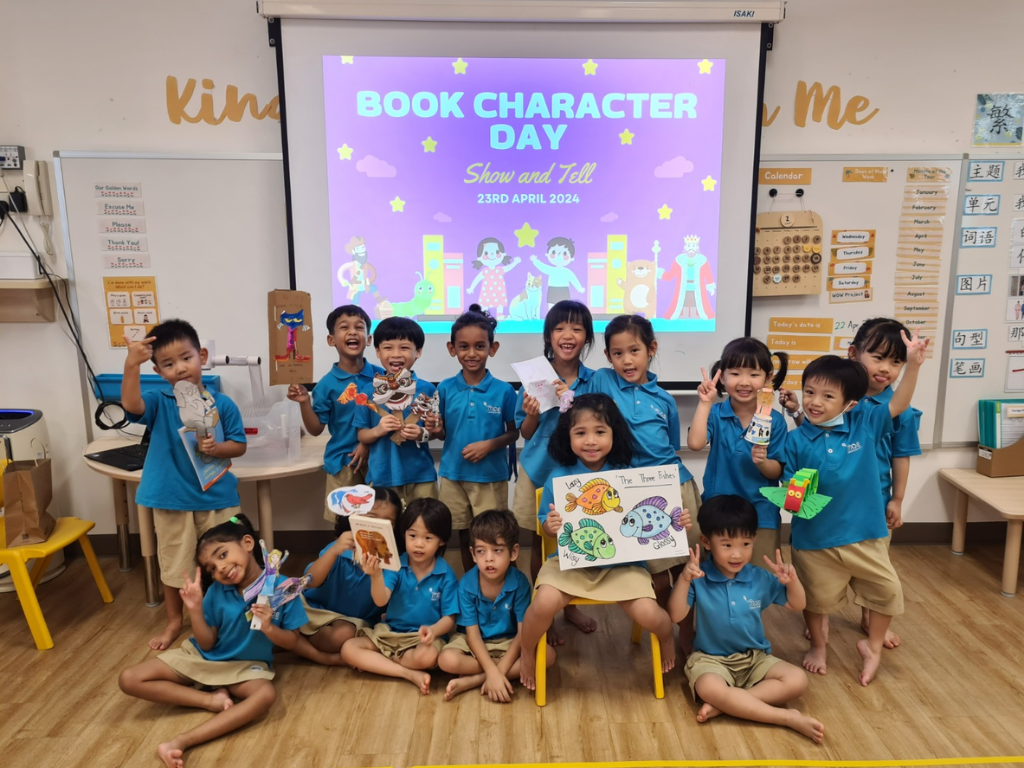 MOE Kindergarten children proudly display their storybook-inspired crafts and costumes during Book Character Day, celebrating their love for reading.